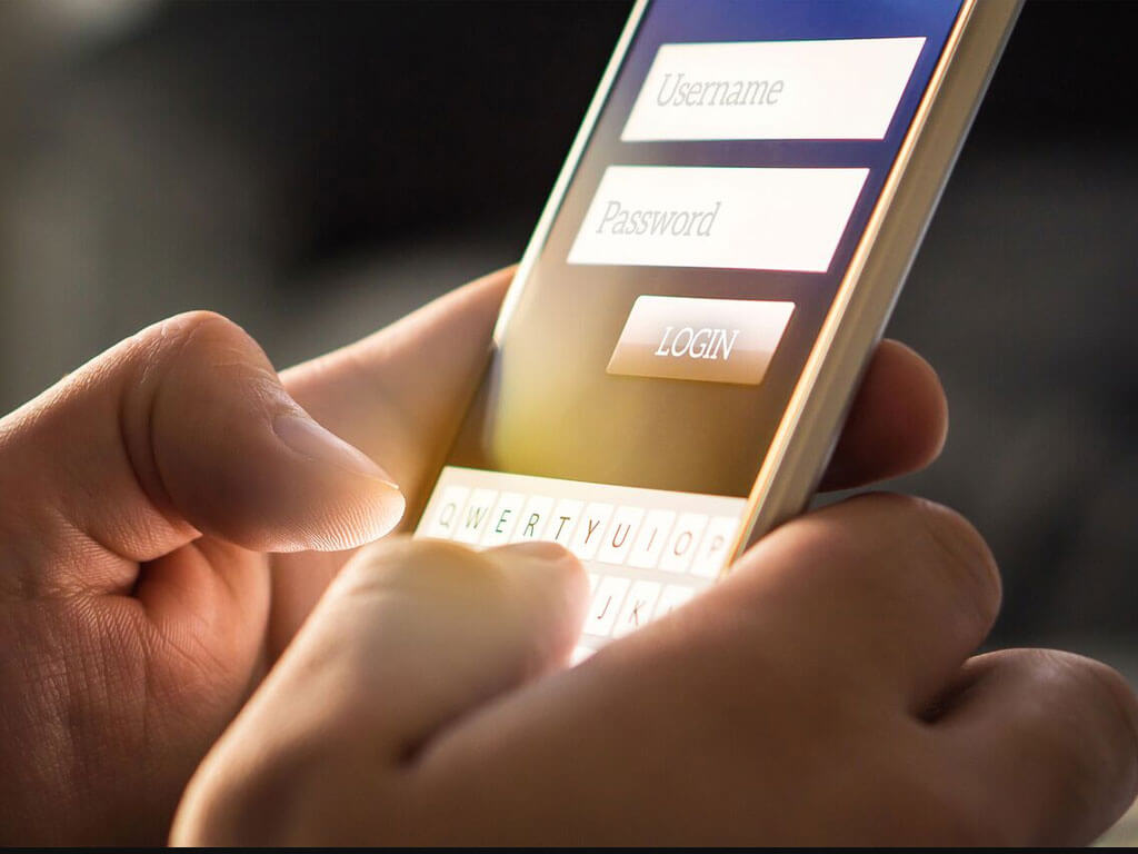 Smartphone closeup - user entering login details