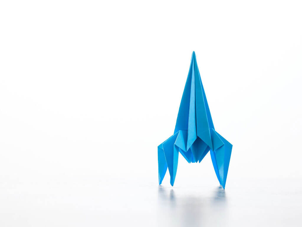 Rocket made out of blue paper