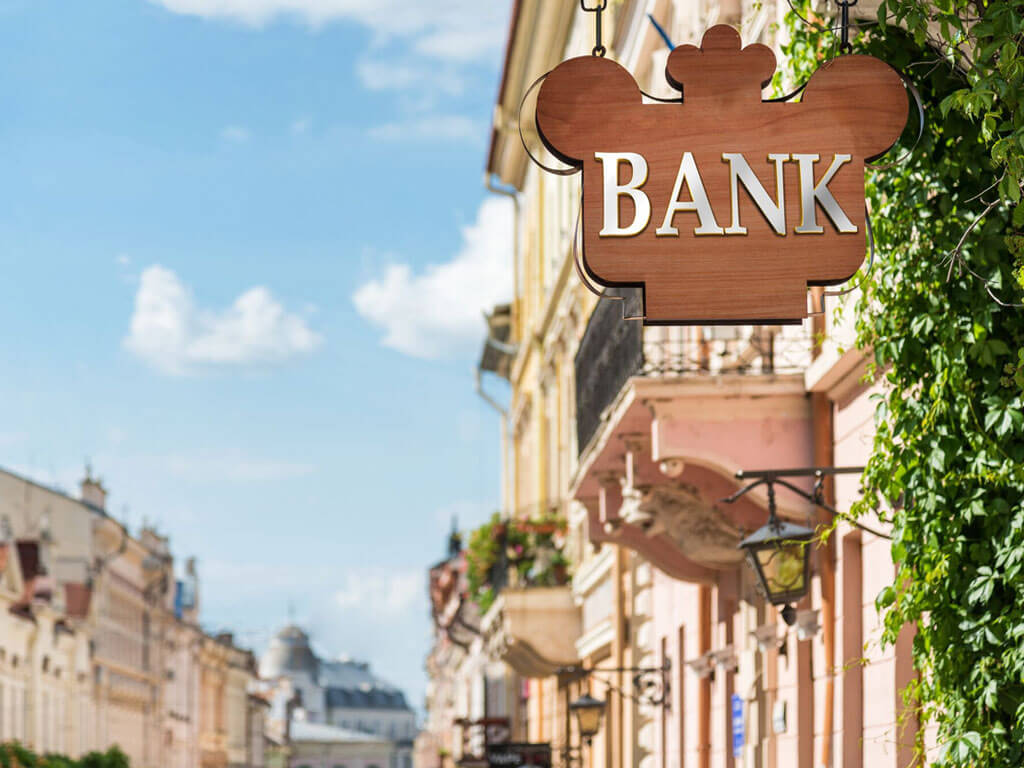 A local high-street bank sign on a sunny day