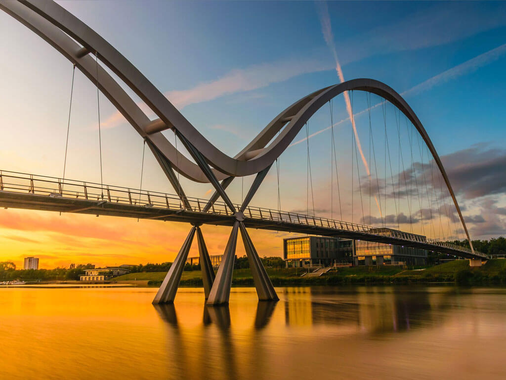 View of a modern bridge on a golden sunset light