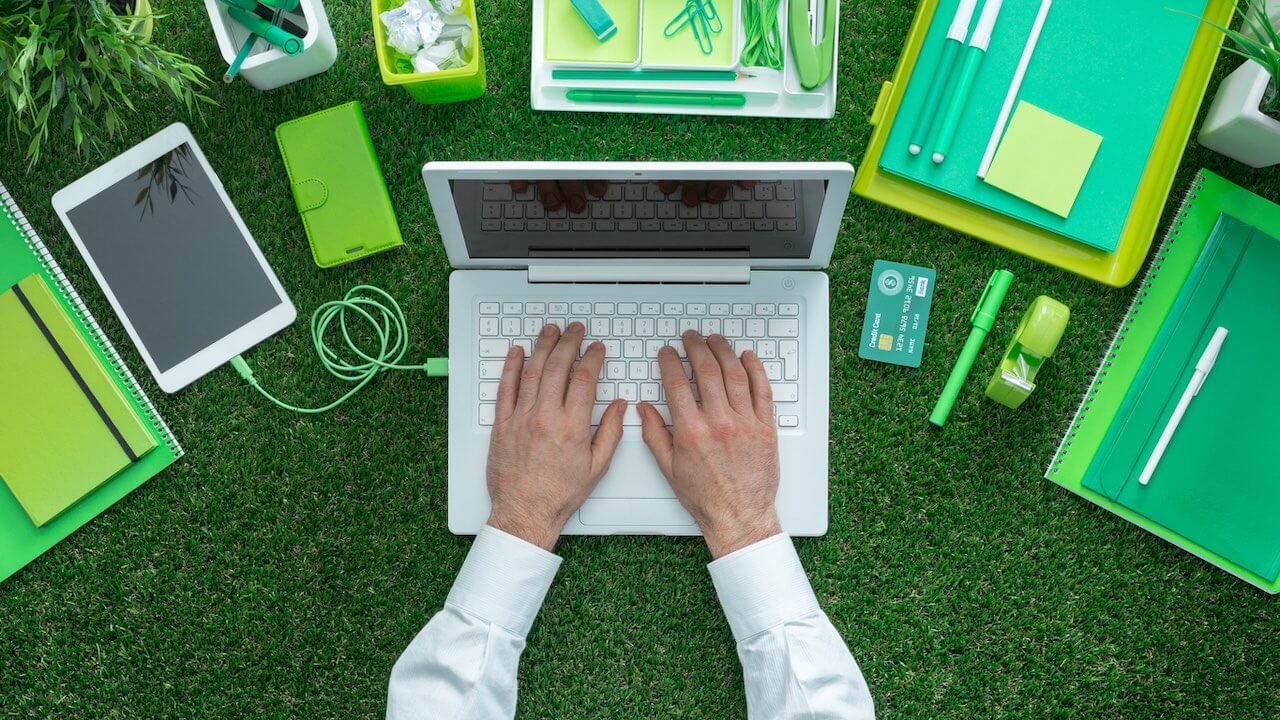 Male hands on a laptop keyboard